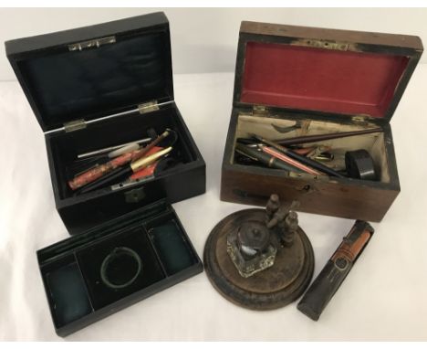2 vintage writing boxes and contents. Include dip pens & fountain pens. Together with ink well on wooden base. 