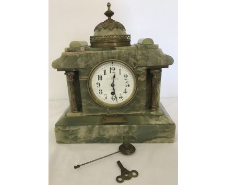 A Dent, London heavy Onyx mantel clock with pendulum and key. With presentation plaque Approx. 36.5cm tall.