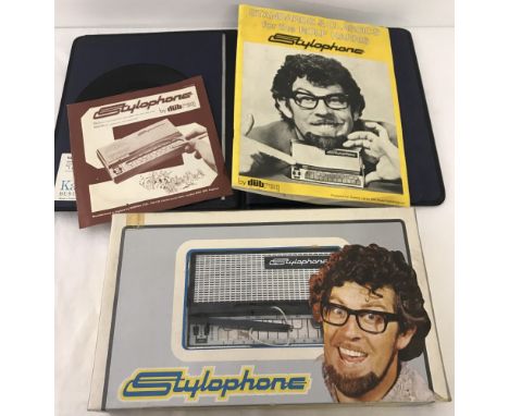 A boxed vintage Stylophone with cased sheet music and instruction manual.  