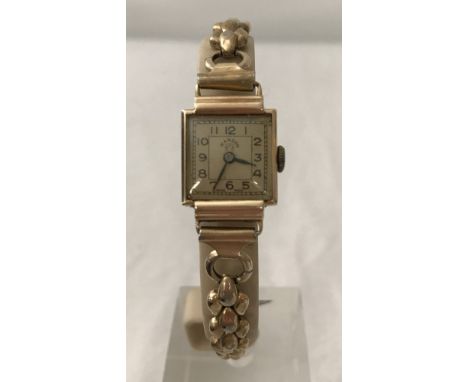 A ladies vintage Mardon 9ct gold case cocktail wristwatch with  Champion flex gold plated strap. In working order. 