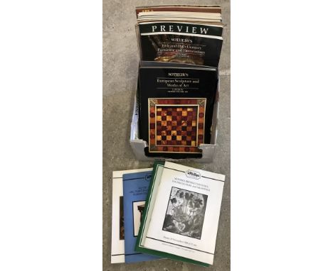 A box of auction catalogues and collectors magazines. To include Phillips, Sotheby's and vintage copies of Antique collector 