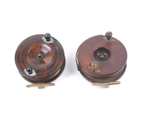 Two vintage large wooden 'Starback' sea fishing reels. Comprising a Heaton 6" 'Eton Sun' with on/off check, mounted with wood