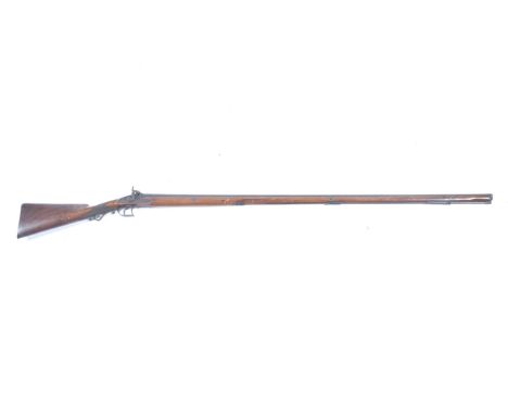 A single barrelled percussion long gun. 49 inch octagonal barrel with decoration, an interesting item with 20 gauge bore. SEC