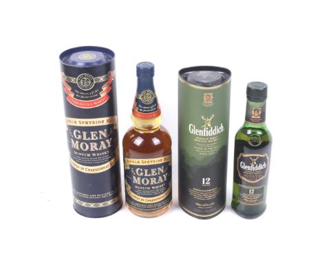 Two bottles of scotch whisky. Comprising a bottle of Glen Moray, 70cl, 40% vol, boxed and a bottle of Glenfiddich 12 year sin