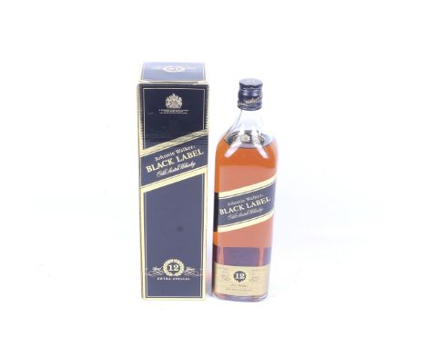 A bottle of Johnnie Walker black label 12 year old extra special scotch whisky. 1l, 43% vol, boxed.