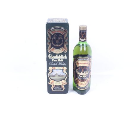A bottle of Glenfiddich pure malt scotch whisky. Boxed, 75cl, 40% vol.