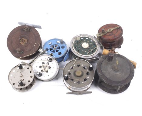 A collection of eight vintage fishing reels. 