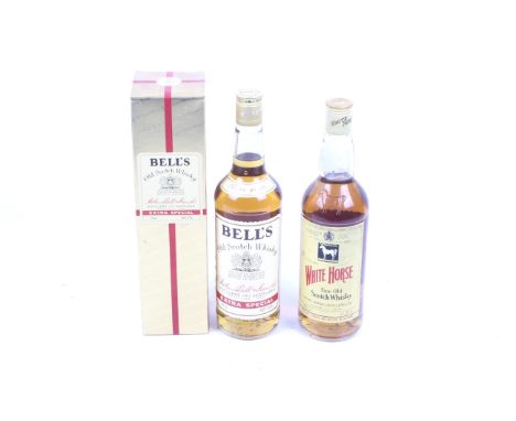 Two bottles of scotch whisky. Including a bottle of white horse, 75cl, 40% vol and one bottle of Bells extra special whisky, 