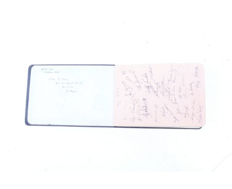 A navy blue bound autograph book containing sporting related autographs form the 1940s/50s. Featuring football teams includin