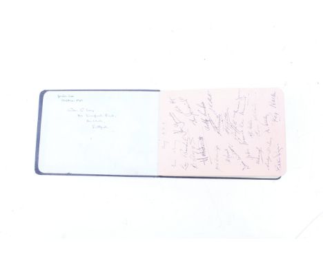 A navy blue bound autograph book containing sporting related autographs form the 1940s/50s. Featuring football teams includin