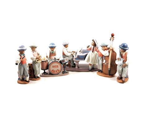 Lladro six piece jazz band, including pianist and singer, length 33cm, saxophone, clarinet, trumpet, double bass and drum kit