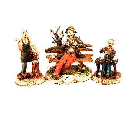 A Capodimonte 'Dolci Ricordi' tramp on bench, signed, 32cm; a watchmaker, signed Arturo; a coppersmith, signed; and a contine