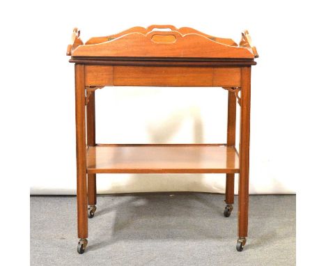 Mahogany butlers trolley, rectangular tray top with folding sides, trolley base with a shelf, on casters, 77x56cm, height 94c