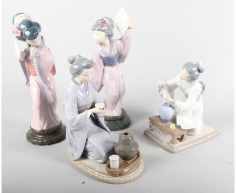 A group of four Spanish porcelain figures, including two matt finish figures, a Casades figure, a Chinese woman and a pair of