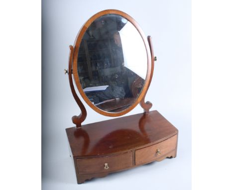 A George III design mahogany dressing table mirror, fitted two drawers, on shaped bracket feet, 17 1/2" wide