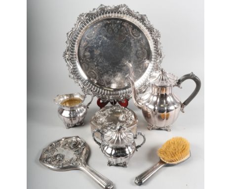 A silver plated on copper three-piece teaset, on tray, together with a dressing table set comprising a brush a jewellery box 