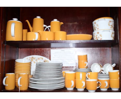 A Royal Doulton "Sundance" combination service, including tea cups and saucers, tea plates, dinner plates, pudding plates, fr