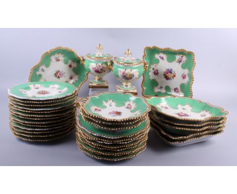 A Worcester Flight Barr and Barr part dessert service, decorated green and gilt borders with hand painted floral decoration, 