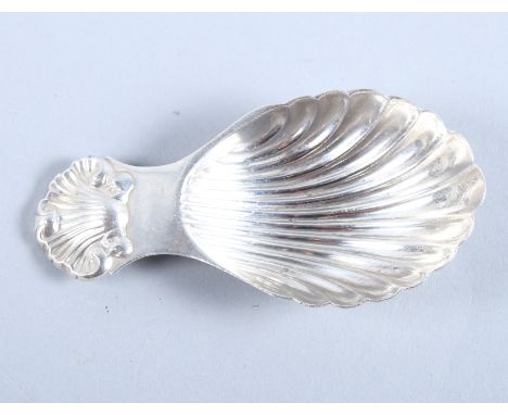 A silver caddy spoon with scallop shell handle and bowl, S J Rose & Son, Birmingham 1966, 2 3/4" long, 0.6oz troy gross