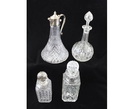 A CLARET JUG with silver plated lidded spout and handle, together with a globe and shaft cut glass DECANTER, and TWO SPIRIT D