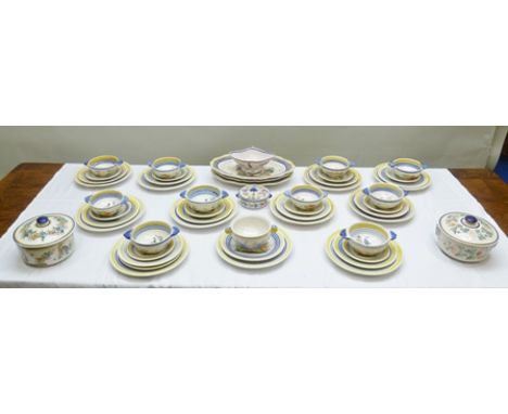 A HENRIOT QUIMPER PART DINNER SERVICE, hand painted Breton figure decoration, comprising; sauce boat, three graduated oval me