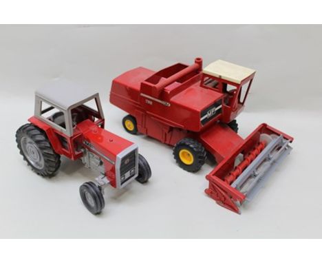 A LARGE SCALE DIE-CAST SHOW ROOM MODEL OF A MASSEY FERGUSON 780 COMBINE HARVESTER, and a MASSEY FERGUSON 595 TRACTOR 