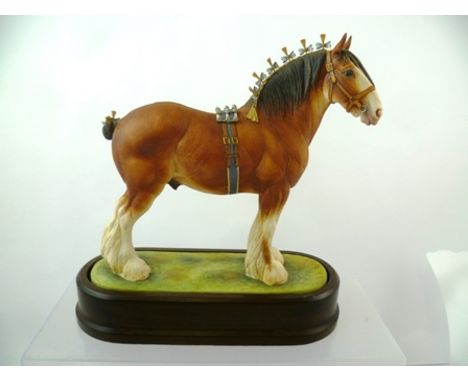 A ROYAL WORCESTER PORCELAIN CLYDESDALE STALLION modelled by Doris Lindner, 24.5cm high, in original box 