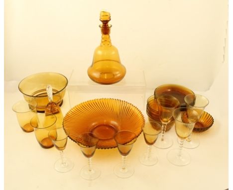 AN AMBER BLOWN GLASS DECANTER OF BELL FORM complete with stopper together with a quantity of AMBER GLASSWARE, includes bowls,