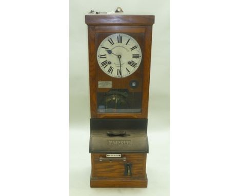 NATIONAL TIME RECORDER CO LTD, AQUINAS STREET, LONDON, SE1. An oak cased factory Time Clock with painted enamel dial and keys