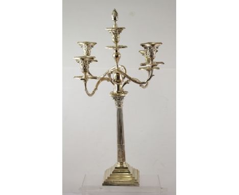 A 20TH CENTURY GEORGIAN STYLE FIVE LIGHT FOUR BRANCH EPNS CANDELABRUM having detachable bead decorated sconces, Corinthian ca