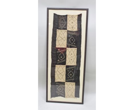 A FIRST HALF 20TH CENTURY ABORIGINAL DREAMTIME WEAVING titled 'The Journey', 104cm x 37cm in glazed plain frame 