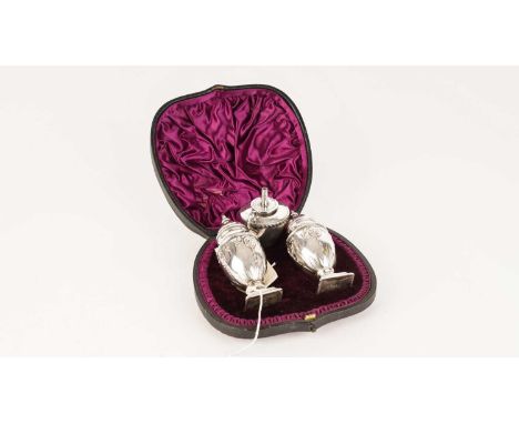 A pair of silver pepper pots, by Henry Wilkinson &amp; Co, London 1891, of classical urn form, in fitted case; together with 