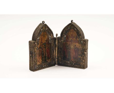 A champleve enamel diptych Christian icon, the interior arched panels hand painted with Christ's baptism and crucifixion, in 
