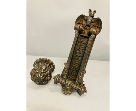 Cast Iron Letter Box with knocker surmounted with a Bat with reg.Design Lozenge &amp; a cast Iron door pull both 19th C.     