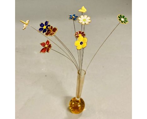 Ten enamel flower and glass vase 