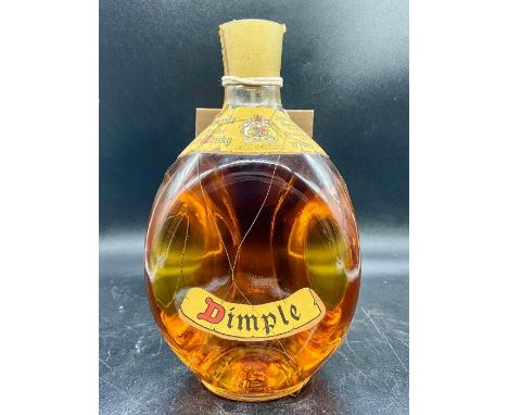 A bottle of Dimple old blended scotch whisky 