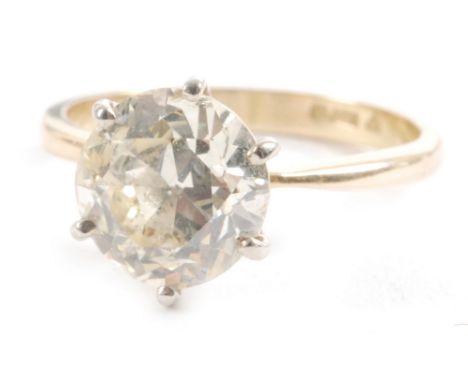 Amendment - An 18ct hallmarked diamond solitaire ring, claw high set old cut stone weight approximately 2.75ct, colour P/O, c