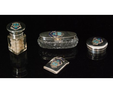 A hallmarked silver match book cover, with a small circular pin box, a salts jar and a dressing table jar and cover, each dec