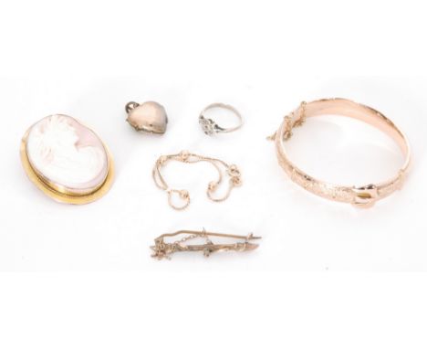 A hallmarked 9ct rose gold hinged buckle bangle, weight 9.8g. Birmingham 1911 with five other items to include a cameo brooch