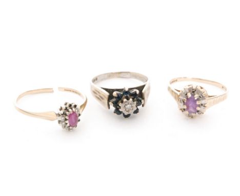 Three 9ct hallmarked stone set rings, a sapphire, a ruby and an amethyst example, A/F. (3) 