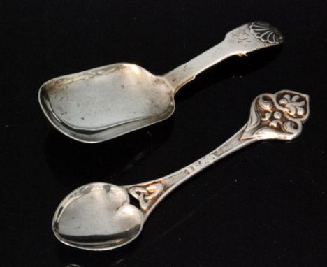 A  George IV hallmarked silver fiddle pattern caddy spoon with acanthus leaf to terminal, London 1823, with a similar Art Nou