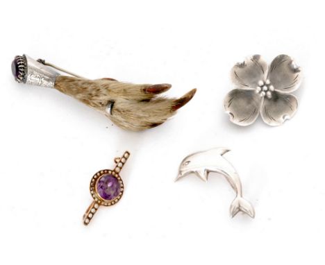 A Danish silver brooch modelled as a flower head, possibly Niels From, with a grouse foot brooch, a 9ct amethyst and pearl br