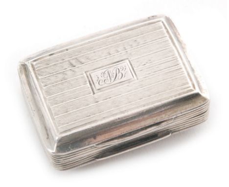 A George IV hallmarked silver rectangular vinaigrette with engine turned decoration within plain borders, opening to floral d