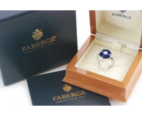 A contemporary Victor Mayer for Faberge 18ct white gold ring, central brilliant cut collar set diamond to a circular blue ena