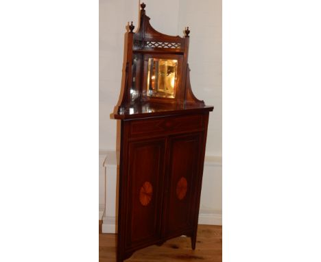 Late Victorian mahogany standing corner cabinet with mirrored shelf back over panelled cupboard base, 64cm w