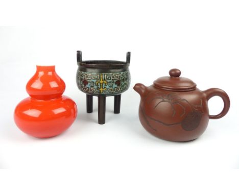 Chinese Yixing clay teapot, a Chinese bronze incense burner, exterior with turquoise enamelled band, and a Japanese red doubl