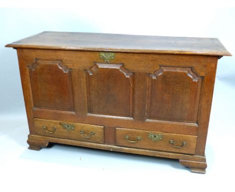 George III oak mule chest, the arched triple panelled front over two drawers on ogee bracket feet, 150cm w