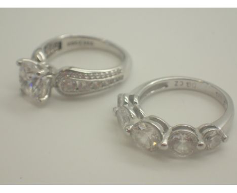 Two silver rings stamped 925 both K