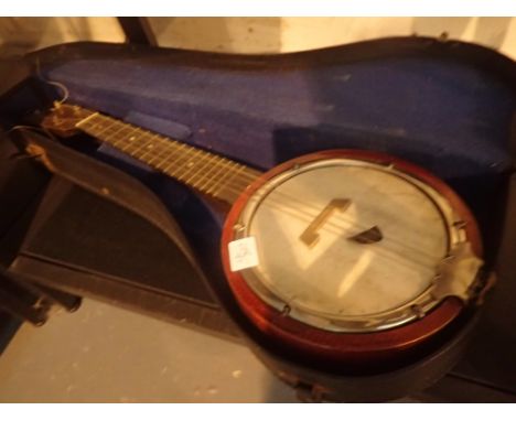 Vintage cased four string ukulele