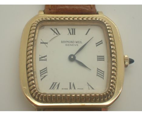 Raymond Weil yellow metal wristwatch on leather strap   CONDITION REPORT:  This item is working at lotting.We do not comment 